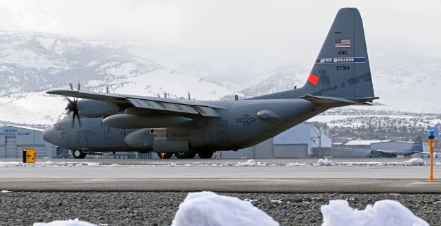 Lockheed C-130 Hercules (93-7314) - "Roller One Four" (937314, a C-130H) has just landed on 16L and is slowing as it passes my spotting position.