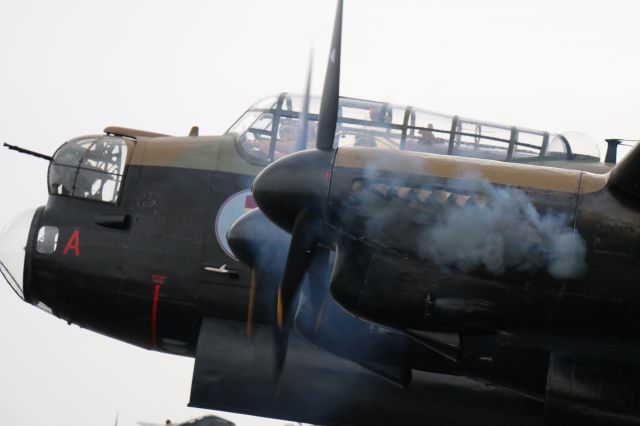 — — - Canadian Warplane Heritage Lancaster fires up ahead of a warm-up flight from Gatineau, Que. On Sunday, Sept. 20, 2015, the Lancaster and other aircraft will be participating in a fly-over in Ottawa, Not. to commemorate the 75th anniversary of the Battle of Britain.