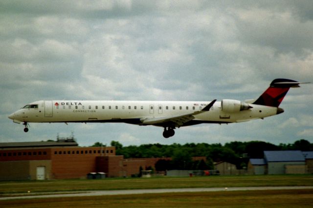 Canadair Regional Jet CRJ-900 (N161PQ) - Flaring for Rwy 36