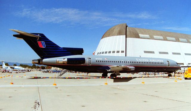 BOEING 727-200 (N7443U) - KNUQ - I don't have paper of the exact date but this was probably Flag Day June 14, 1999 at Moffett Field, Sunnyvale CA USA. There was a huge American Flag to the right___a massive flag that had about 1000 people holding in place. San Jose PD had their early Model MD 500 helicopter N904PD and giving rides up in the air above the airfield to get photos of the US Flag. The "Plane Pull" was many teams and I think it was for Charity. As seen in my earlier photo today of old colors N7443U,,,I didn't even know I had a photo of both color schemes same jet, until today 8/14/2021. I have quite a few photos, and sometimes I'd film events, develop the film, glance at them, and file them away in a box, never to look at them for years. Note the aircraft doors open for ventilation and the rear air-stairs down for access, but I did not see them giving Tours. Back to N904PD, this was SJPD's helicopter that crashed in San Jose years later taking the SJPD Officer Pilots life and the Mechanic riding with him. A terrible event, the Pilot wrestling the Helo to an open intersection in NW San Jose to avoid hitting any buildings, and losing altitude fast and impacting the street. This 727 was stored VCV in 2001 and broken up later, LN: 1513.