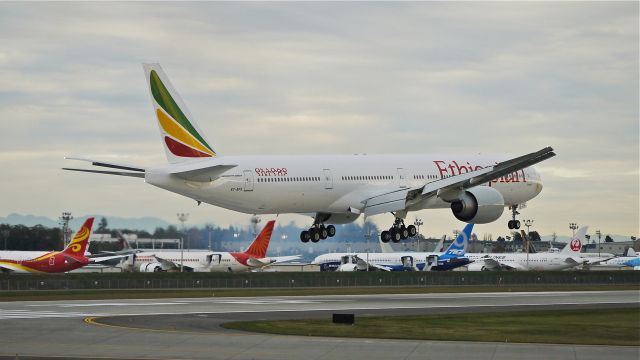 BOEING 777-300 (ET-APX) - BOE386 on final to Rwy 16R to complete a flight test on 11/1/13. (LN:1150 cn 42101).