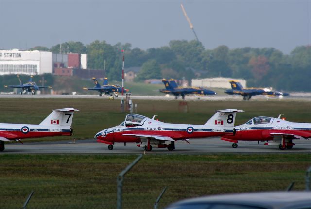 — — - the uniqueness of this shot is that you can see the Canadian Snowbirds and the Blue angels in the same shot...