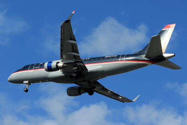 Embraer 170/175 (N814MD) - Check out the left engine cowling.