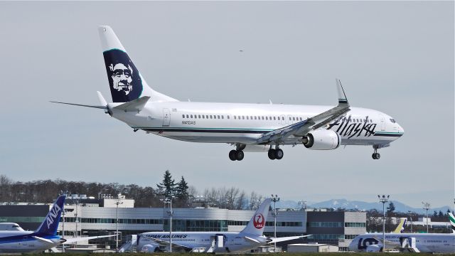 Boeing 737-900 (N413AS) - ASA9401 on final to runway 16R to complete its delivery flight from KBFI on 3/25/13. (LN:4386 cn 35205).