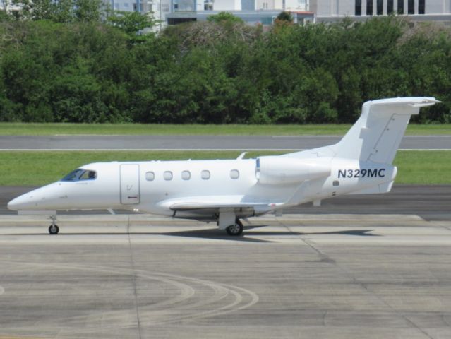 Embraer Phenom 300 (N329MC)