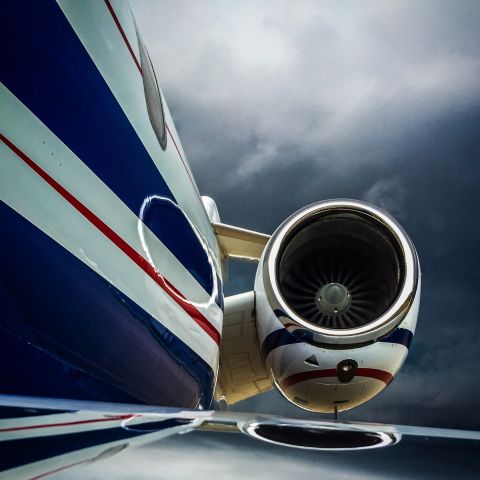 Bombardier Challenger 300 (N541FX) - Signature Flight Support ramp. Landed just before a line of thunderstorms rolled over the airport. We landed 19L, and a few minutes later we had cold front passage, forcing a United and Virgin America to go around due to tailwinds. Impressive lightning show and amazing lighting after the passed caused by the setting sun.