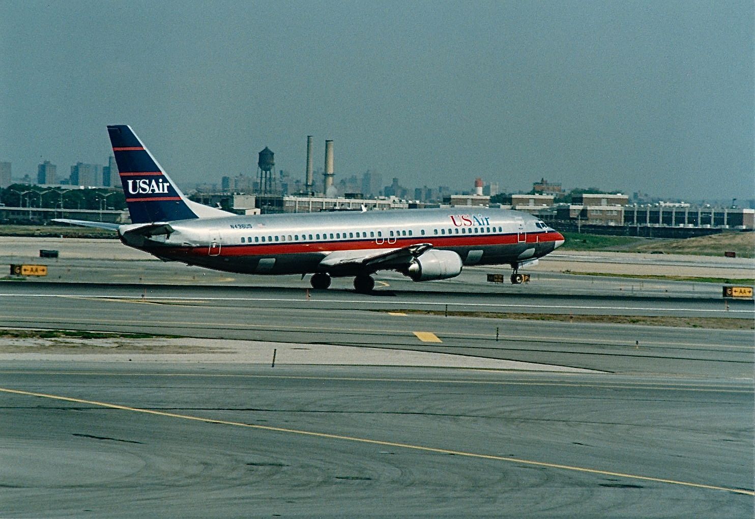 Boeing 737-700 (N438US) - US Air B-737 taking off at KLGA