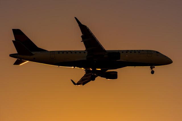 EMBRAER 175 (long wing) (N603CZ) - This Delta Embraer arrives into Calgary's 35R at sunset.