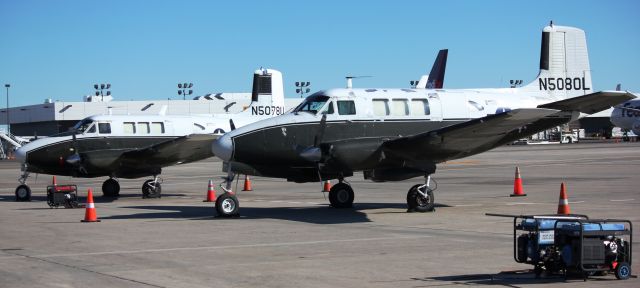 Beechcraft Queen Air (65) (N5080L) - A pair of ex-Army Queen Airs now flying cargo for Key Lime Airlines.