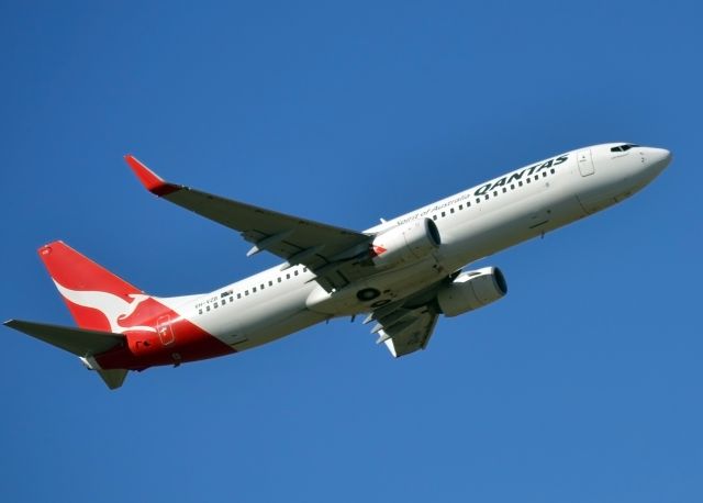 Boeing 737-800 (VH-VZB) - Up, up and away from runway 23.