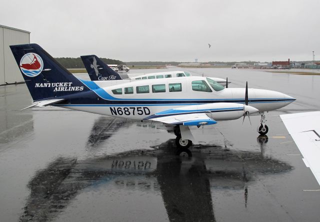 Cessna 402 (N6875D) - Another rainy day at the Cape.