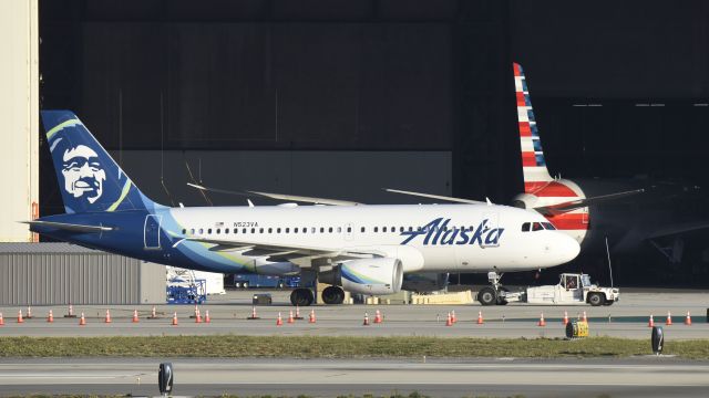 Airbus A319 (N523VA) - Getting towed to gate at LAX