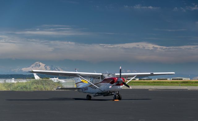 — — - US Cessna at CZBB with Mount Baker in background