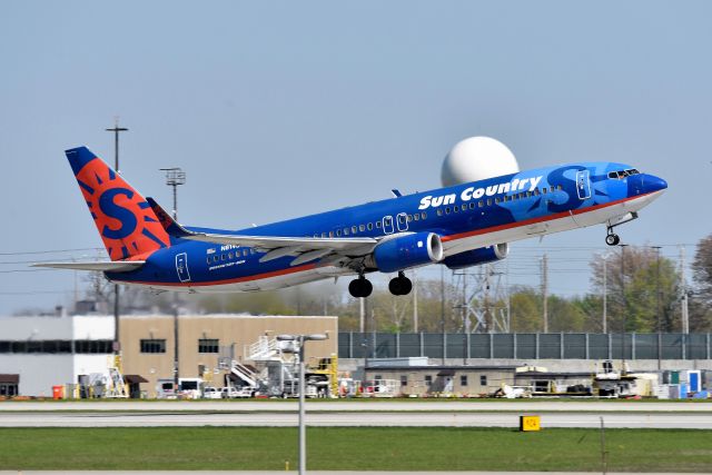 Boeing 737-800 (N814SY) - Heavily modified B738 with weather radar mounted atop fuselage. Okay, just kidding. That is a weather radar on the other side of the highway however. Shown departing 23-L on 04-26-21.