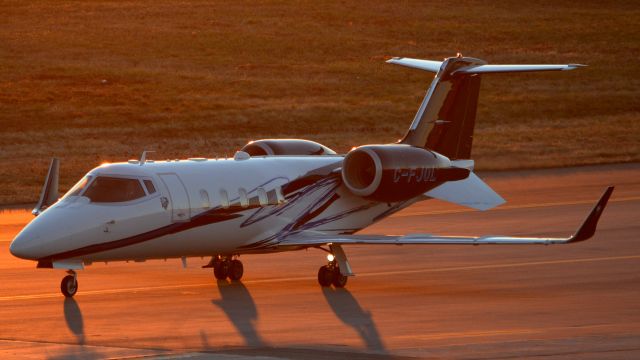 Learjet 60 (C-FJOL) - Taxiing out at sunset.