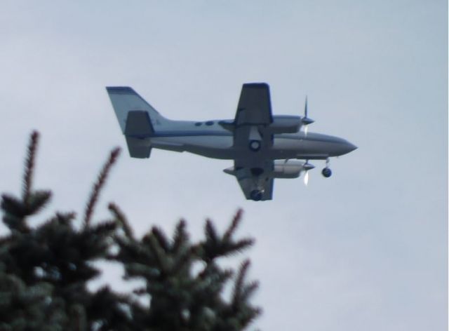 Cessna 421 (N744CA) - N744CA over Corvallis, Oregon on approach to CVO.  26th February 2019.