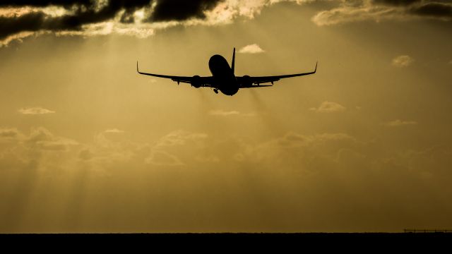 Boeing 737-800 (N836NN) - American airlines departing St Maarten at sunset