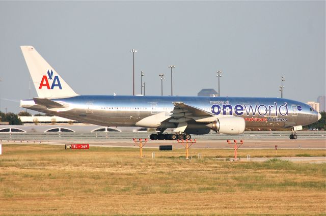 Boeing 777-200 (N791AN) - Waiting its turn to leave for Tokyo, this member of One World sits on the north end of 18L