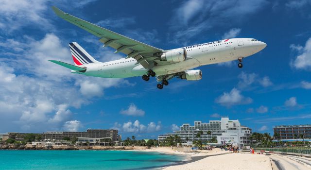 Airbus A330-200 (F-GZCG) - Air France over maho beach while landing at St Maarten.