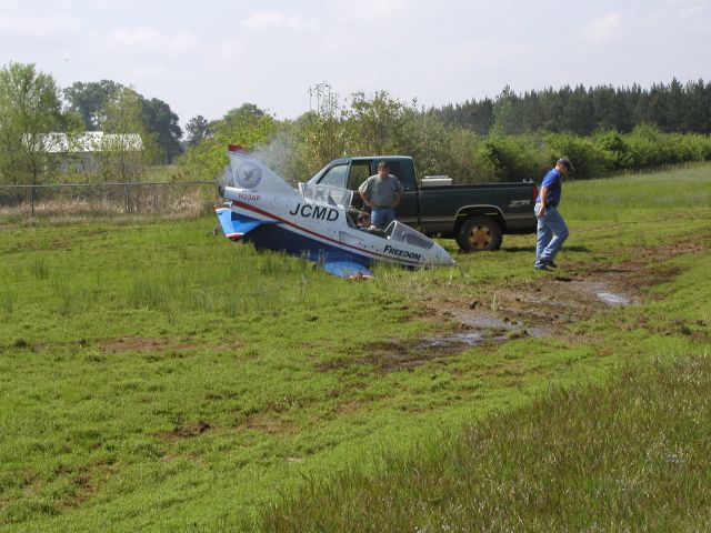 BD-MICRO Micro (BD-5J) (N23AP) - Bede BD-5J runs off the runway during landing. It takes out a VASA light and the gear collapses—picture 2 of 9.