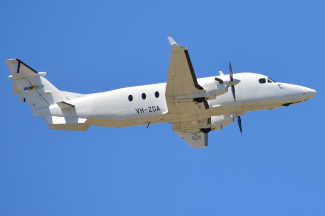 Beechcraft 1900 (VH-ZOA) - Get off airborne off runway 23 and heading off to another regional destination. Thursday 6th March 2014.