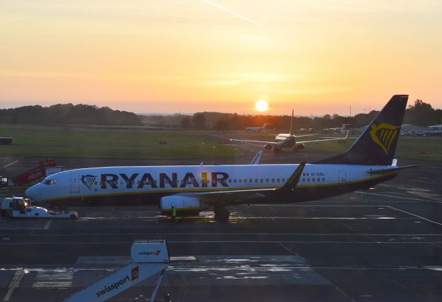 Boeing 737-800 (EI-ENL) - Ryanair - B738-8ASWL (EI-ENL) Photo taken just after sunrise at NCL. (Photo taken behind glass window in the "departure" lounge). (Photo Oct 2022).