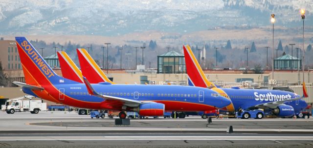 Boeing 737-700 (N286WN) - Although there had been six Southwest fleetbirds that had RONed at RNO, two were already gone by the time the dawn sky became light enough for me to get this shot as N286WN was being pushed from Gate B11 and backed over to the Southwest apron.