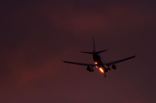 — — - A passenger aircraft makes its landing approach at dusk at Heathrow airport in west London, Britain, March 7, 2016. (Photo by Toby Melville/Reuters)