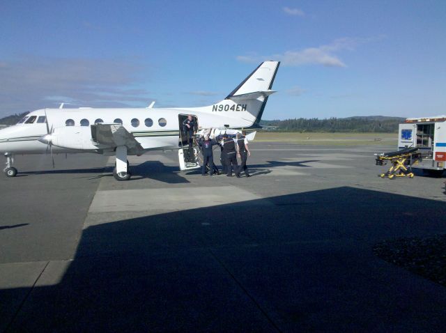 British Aerospace Jetstream 31 (N904EH) - Loading a patient into an Air Ambulance Plane.