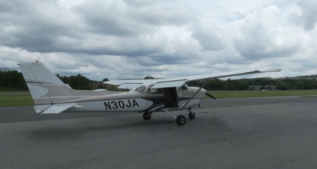 Cessna Skyhawk (N30JA) - Taxiing to departure is this 1976 Cessna Skyhawk 172M on this warrm overcast day in the Summer of 2021.