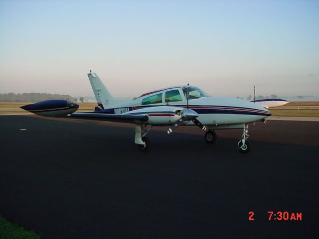 Cessna 310 (N403DM) - Parked on ramp