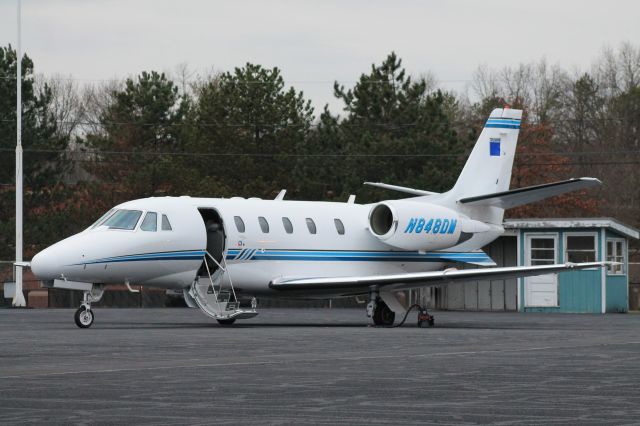 Cessna Citation Excel/XLS (N848DM) - Citation N848DM parked on the ramp with its door open. Very luxurious inside.