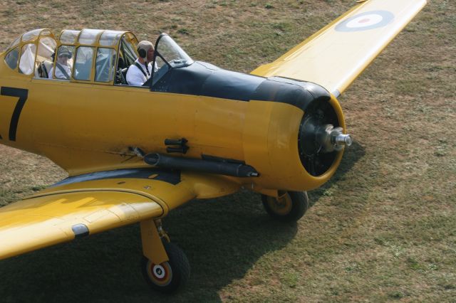 — — - T-6 Texan at Warbirds North Trgo, WI 2009