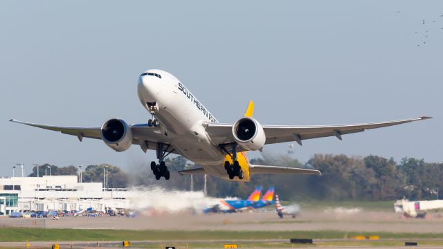 BOEING 777-200LR (N714SA) - Runway 27 departure for tokyo