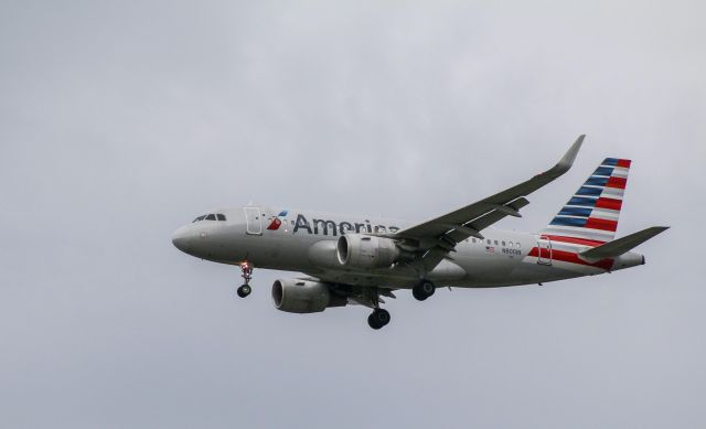 N8001N — - An American Airlines airbus photographed from a nearby parking lot upon approach for landing on a cloudy day.