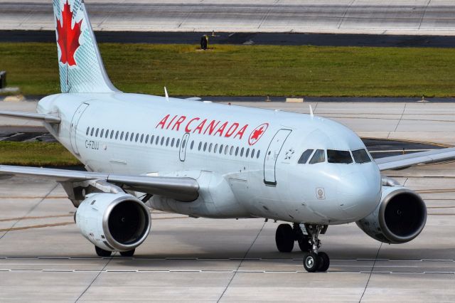 Airbus A319 (C-FZUJ) - ACA938 arriving into Tampa from Toronto (YYZ)br /br /• Delivered to Air Canada September 1997br /• 14 Business Class (2×2) / 106 Economy (3×3)