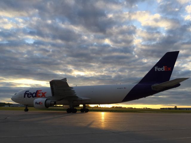 Airbus A300F4-600 (N749FD) - Puffy stratus cloud deck drifts over ATW just in time for sunset and the Fedex Flight 1329 to Madison & Memphis. 