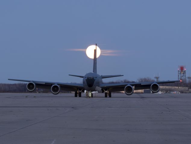 Boeing 707-100 (61-4840) - Moonrise behind a USAF Boeing KC-135R on the cargo ramp at TOL last night, 8 Nov 2022.