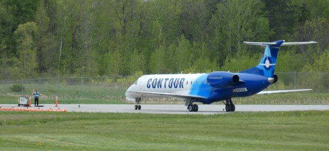 Embraer ERJ-135 (N812AE) - Taxiing to parking is this 2001 Contour Airlines Embraer 140LR in the Spring of 2024.