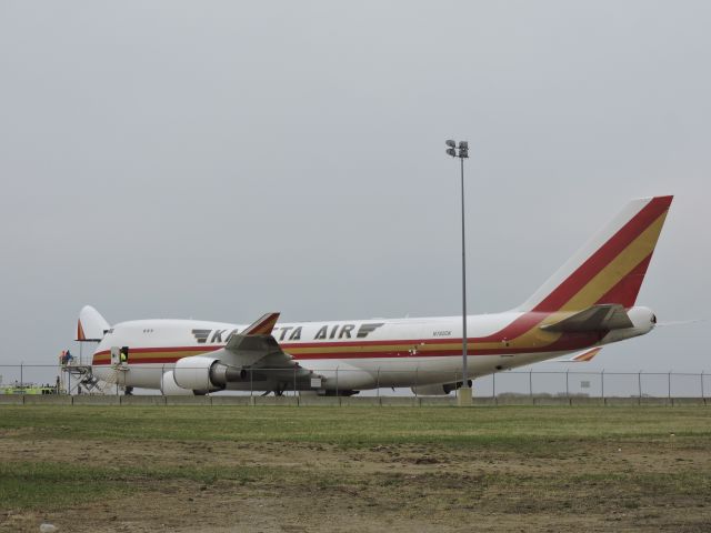 Boeing 747-400 (N782CK) - Unknown event. Airport fire truck and ambulances next to plane.