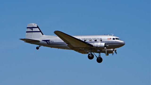 Douglas DC-3 (N877MG) - Historic Flight Foundations Douglas DC-3 (Ser#4193) on final to Rwy 16R on 7/17/14.