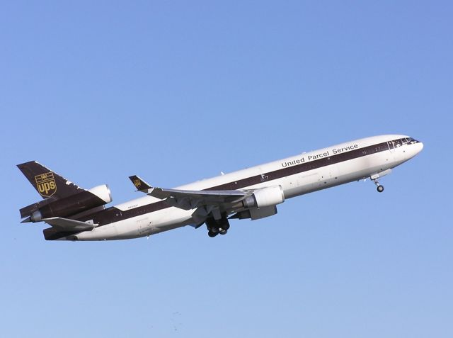 Boeing MD-11 (N253UP) - UPS MD-11 Departing Sydney Australia on 18/07/2005.