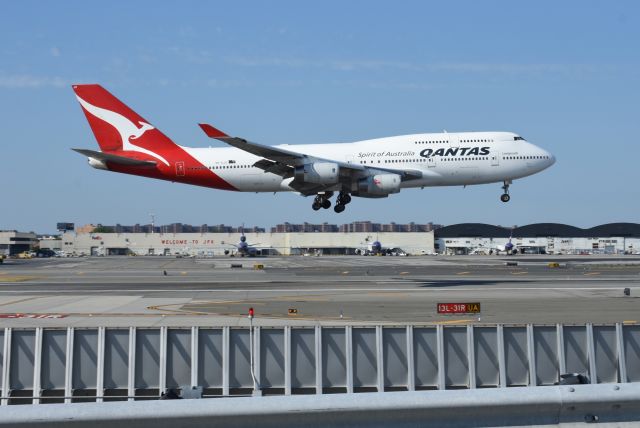 Boeing 747-400 (VH-OJU) - Beautiful shot of a Qantas 747-400 gliding ove 13L at JFK. 