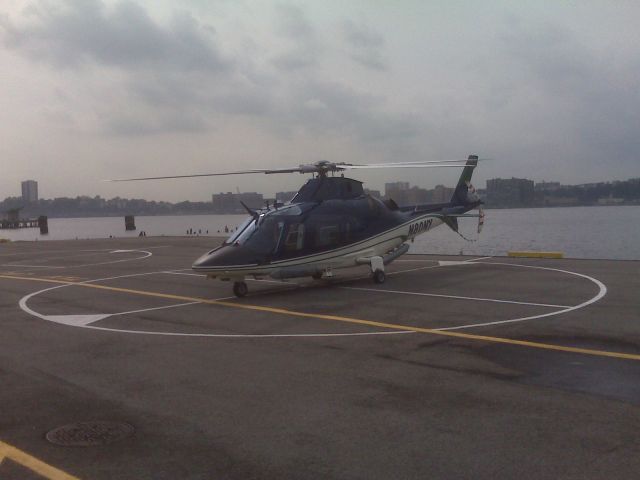 N80NY — - Augusta 109 at Manhattans West 30th Street heliport Sept. 13, 2008. Taken with Blackberry 8310. Aircraft about to depart with two passengers wearning clothing emblazoned with New York Jets logos.