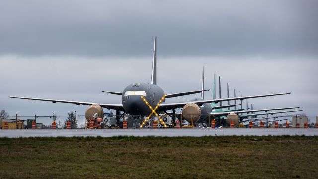 Boeing KC-46 Pegasus — - KC-46A tankers in final build stages lined up on the Boeing side of Paine Field, Everett, Washington, USA