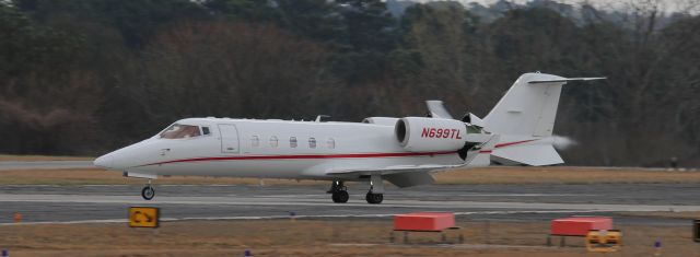 Learjet 60 (N699TL) - Coming to a stop after a long trip