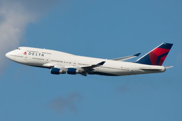 Boeing 747-400 (N675NW) - DAL173 departs runway 31L, next stop Japan.