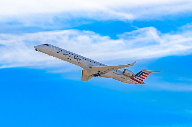 Canadair Regional Jet CRJ-900 (N902FJ) - Mesa Airlines CRJ900 taking off from PHX on 12/1/22. Taken with a Canon 850D and Tamron 70-200 G2 lens.