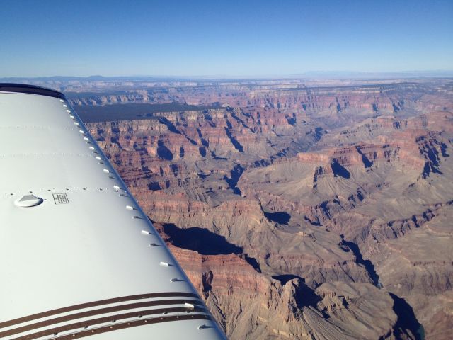 Piper Cherokee (N63BA) - 2010 Oshkosh Lindy Award Winner over Grand Canyon, Arizona 11,500  Zuni Corredor.