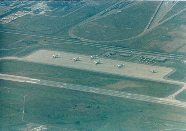 Boeing B-17 Flying Fortress (N3701G) - E-3 South Ramp at KTIK. Picture taken from a B-17 passing over head.